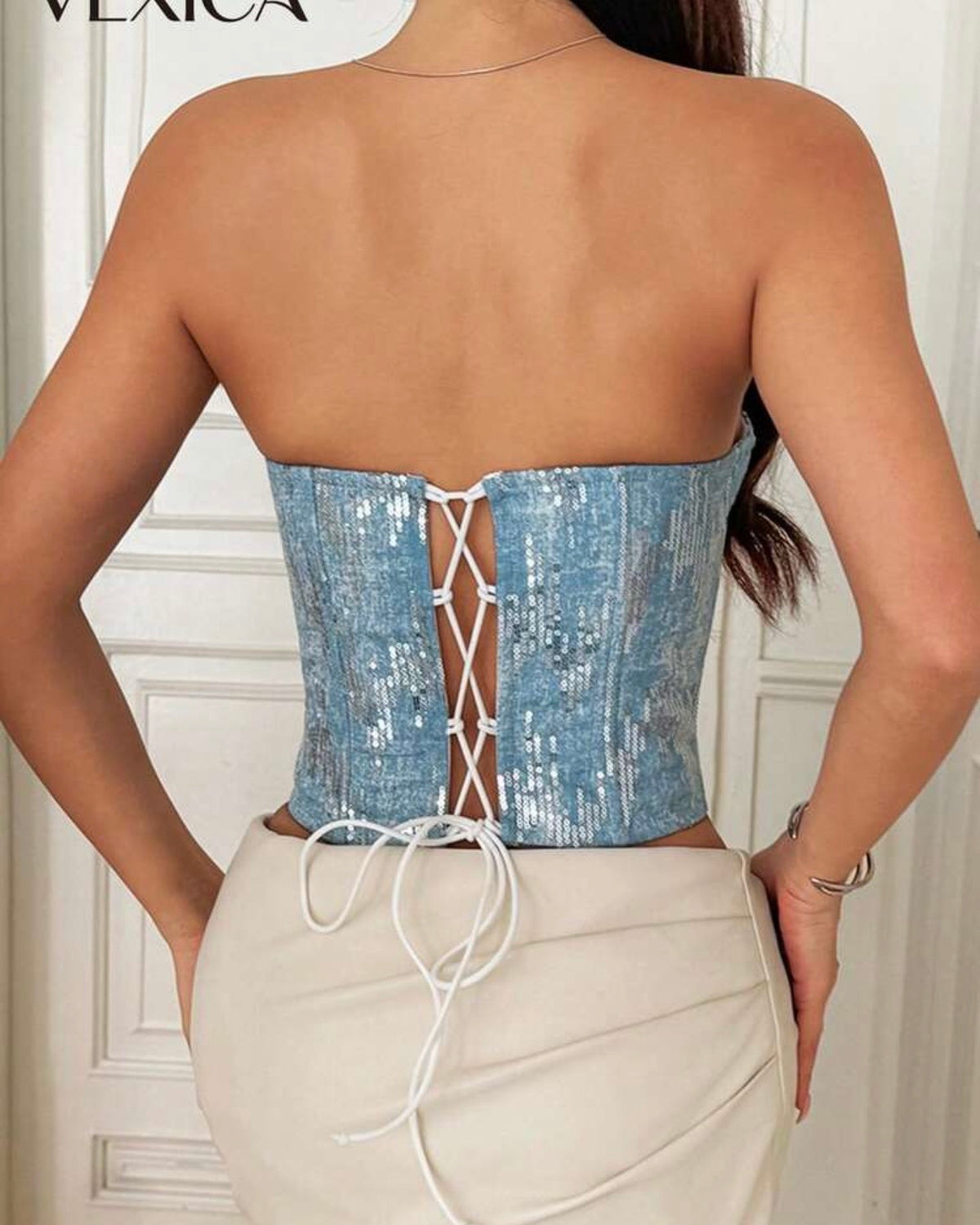 Corset celeste con lentejuelas