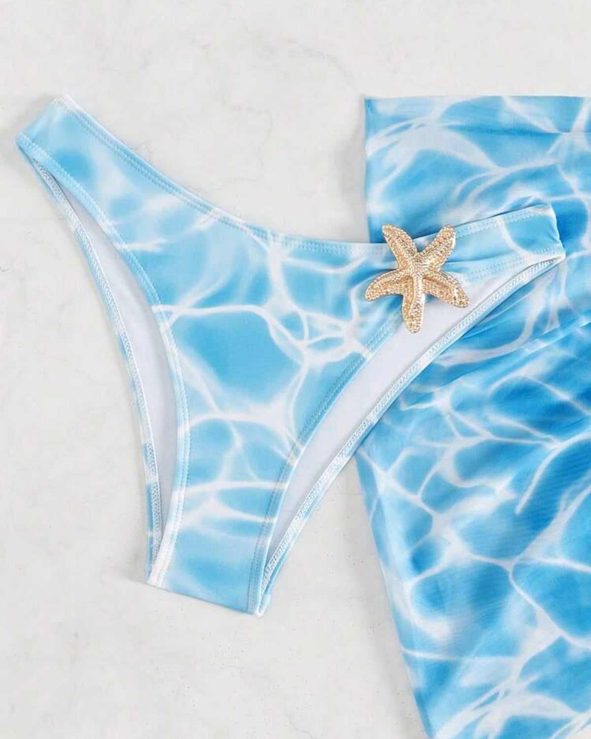 Traje de baño celeste 3 piezas