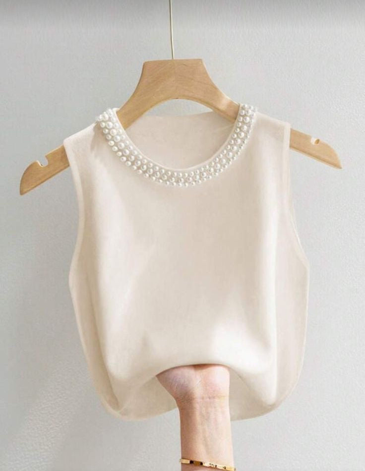 Blusa cuello de perlas