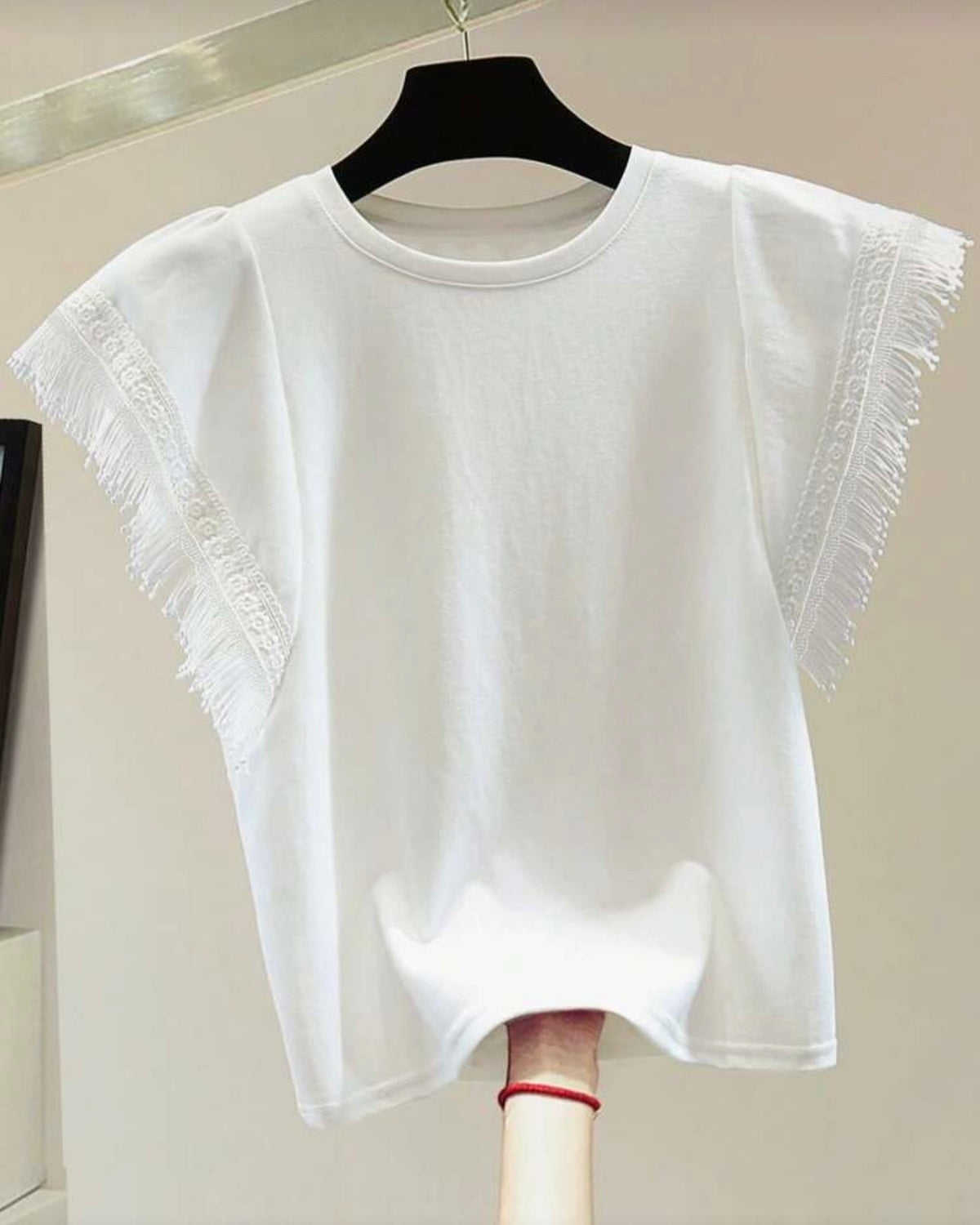 Blusa con barbas