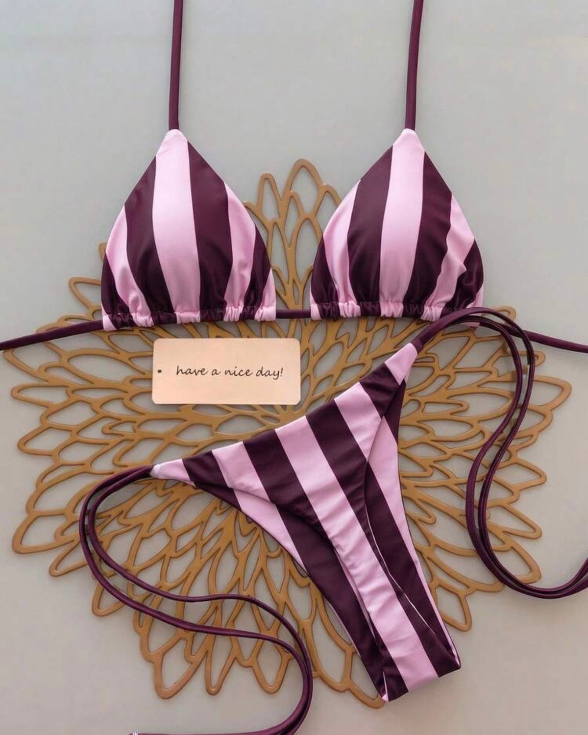 Traje de baño rayas lila morado