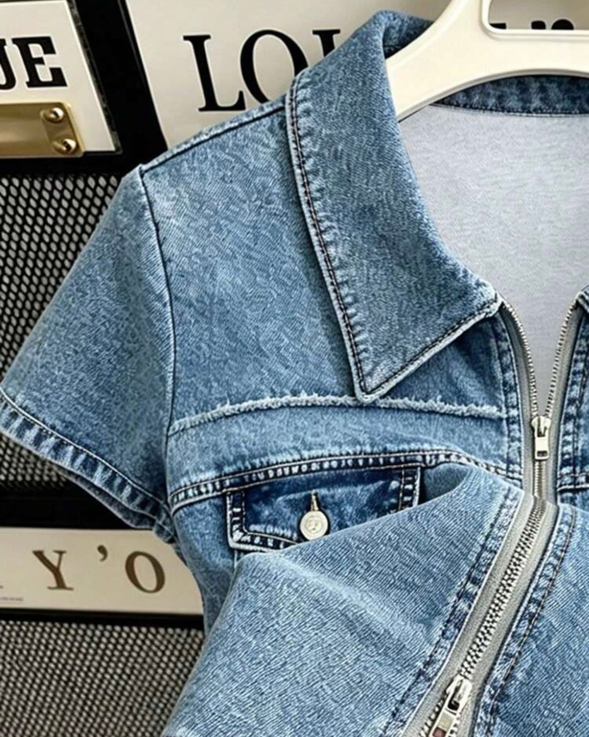 Blusa de mezclilla con cremallera