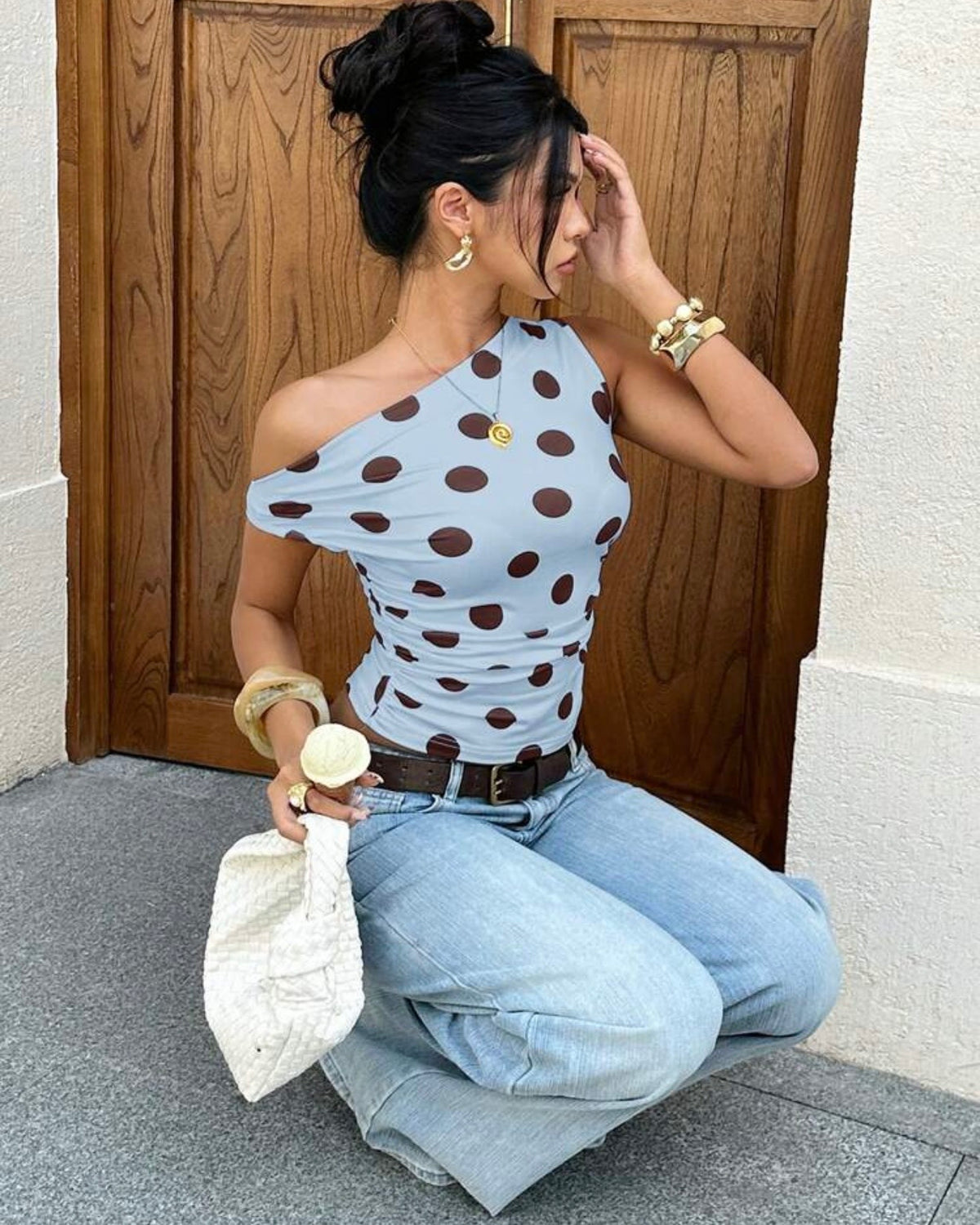 Blusa celeste con pelotas café