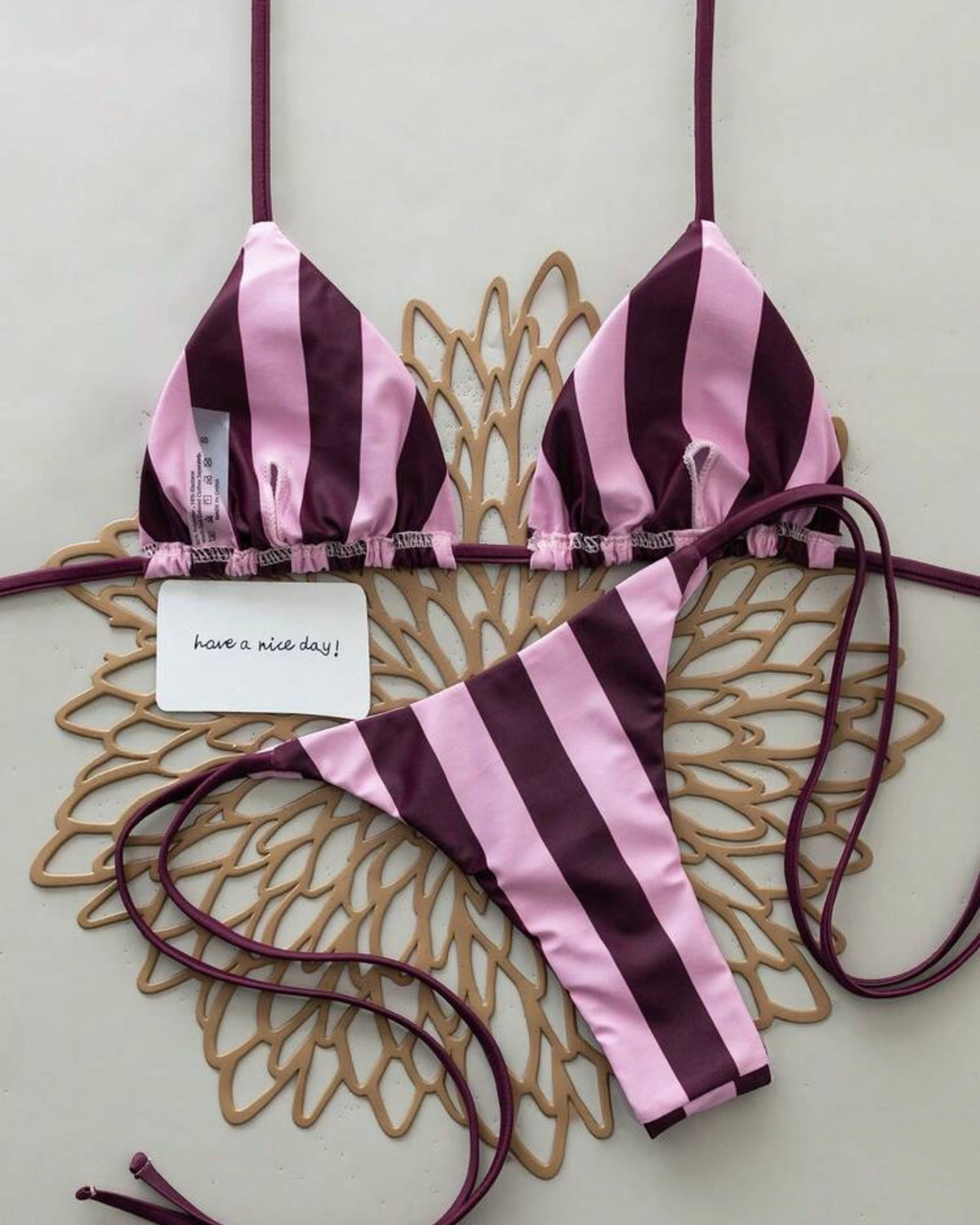 Traje de baño rayas lila morado