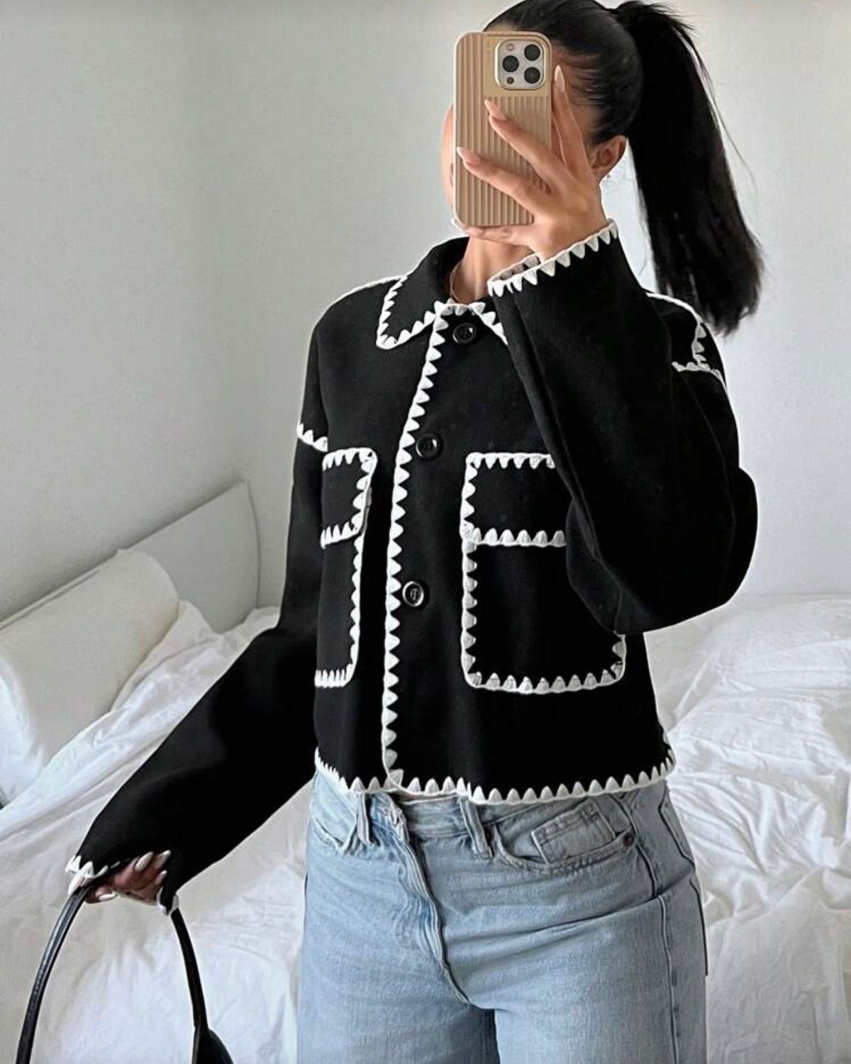 Chaqueta con decoración blanca