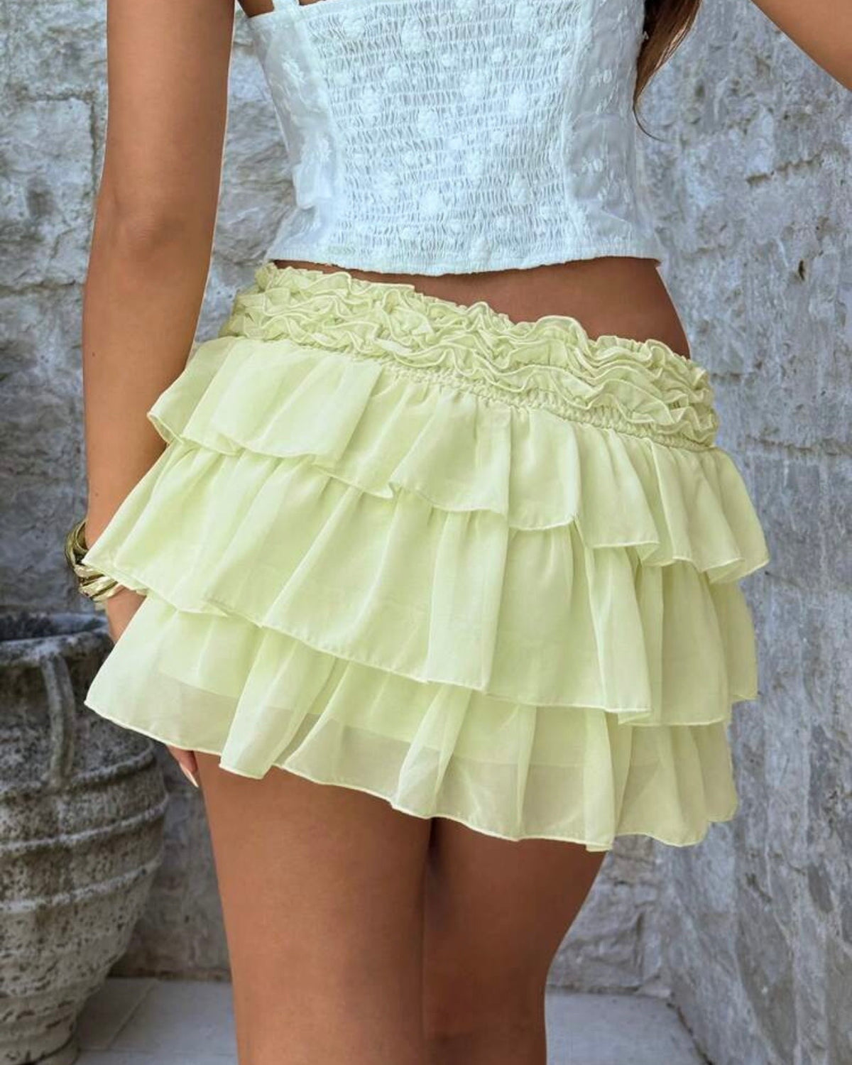 Mini falda amarilla de vuelos