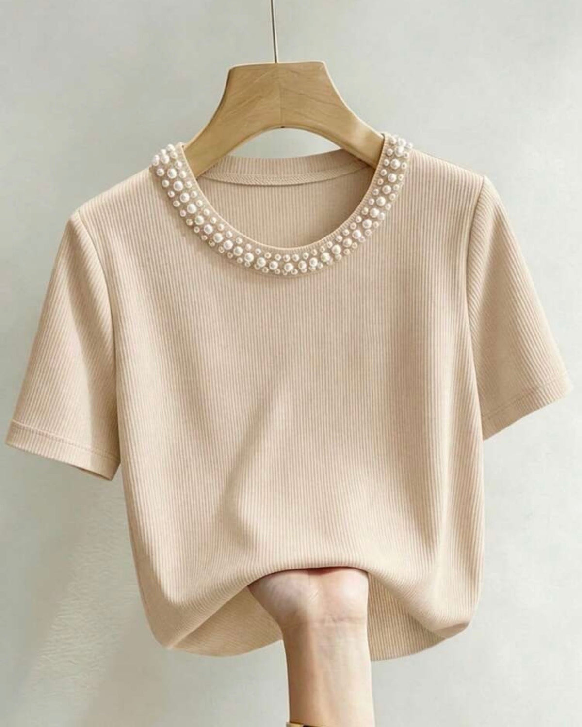 Blusa albaricoque con perlas