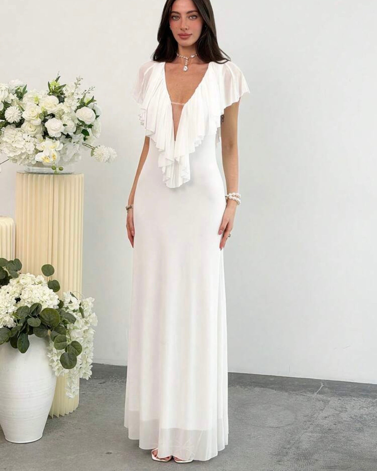 Vestido blanco con vuelos