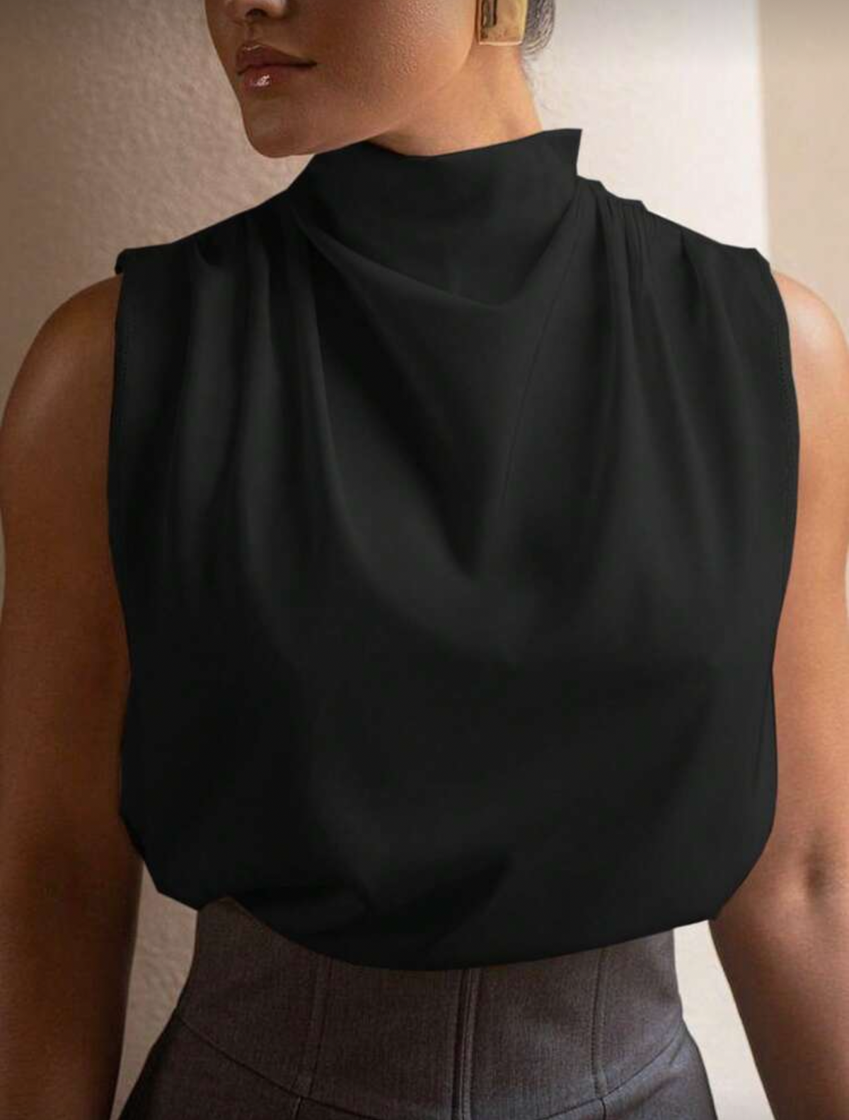 Blusa elegante cuello alto