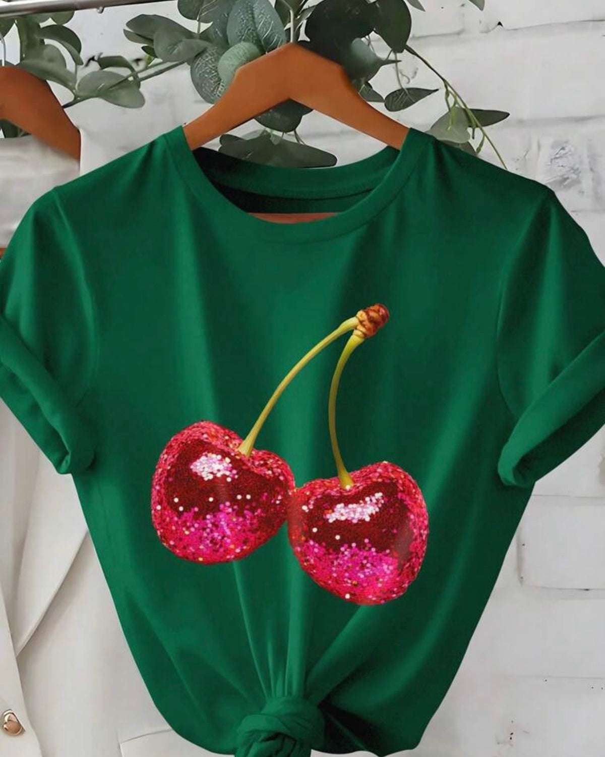Blusa verde de cerezas