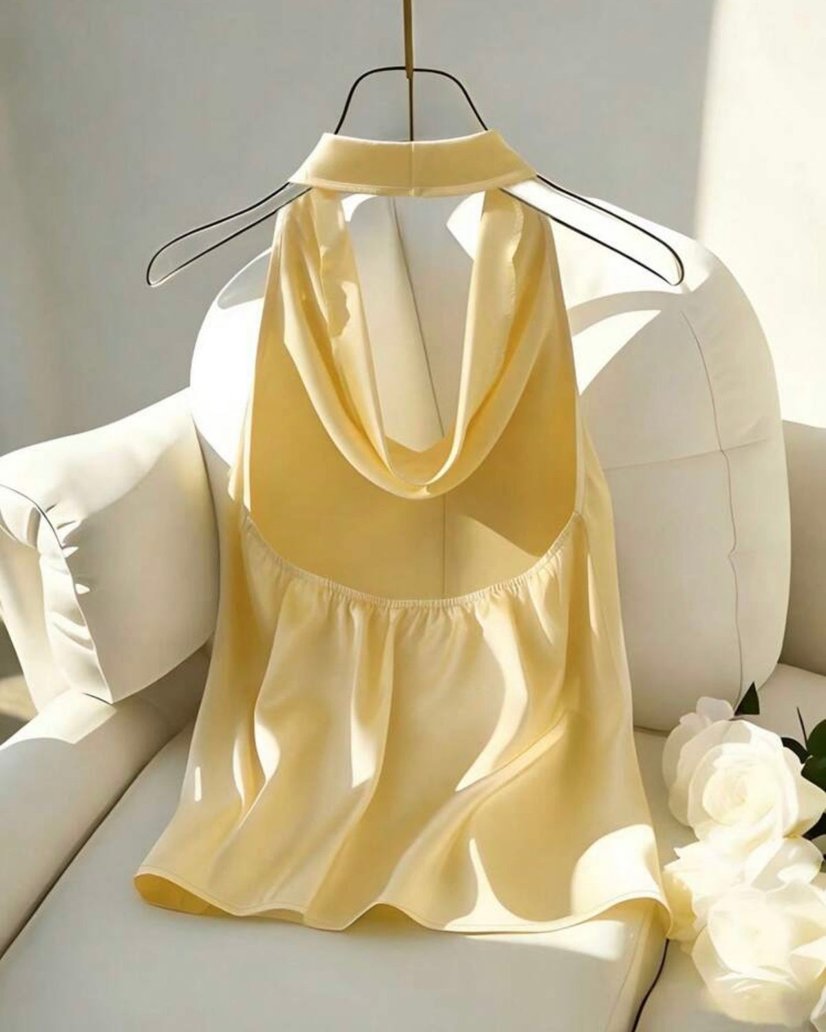 Blusa amarilla satinada