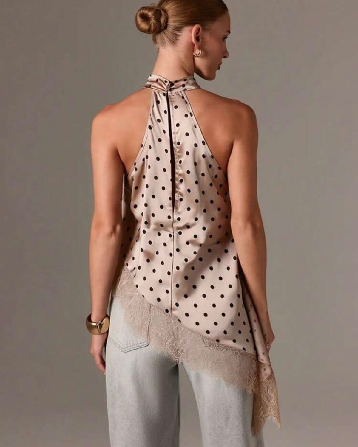 Blusa asimétrica de puntos