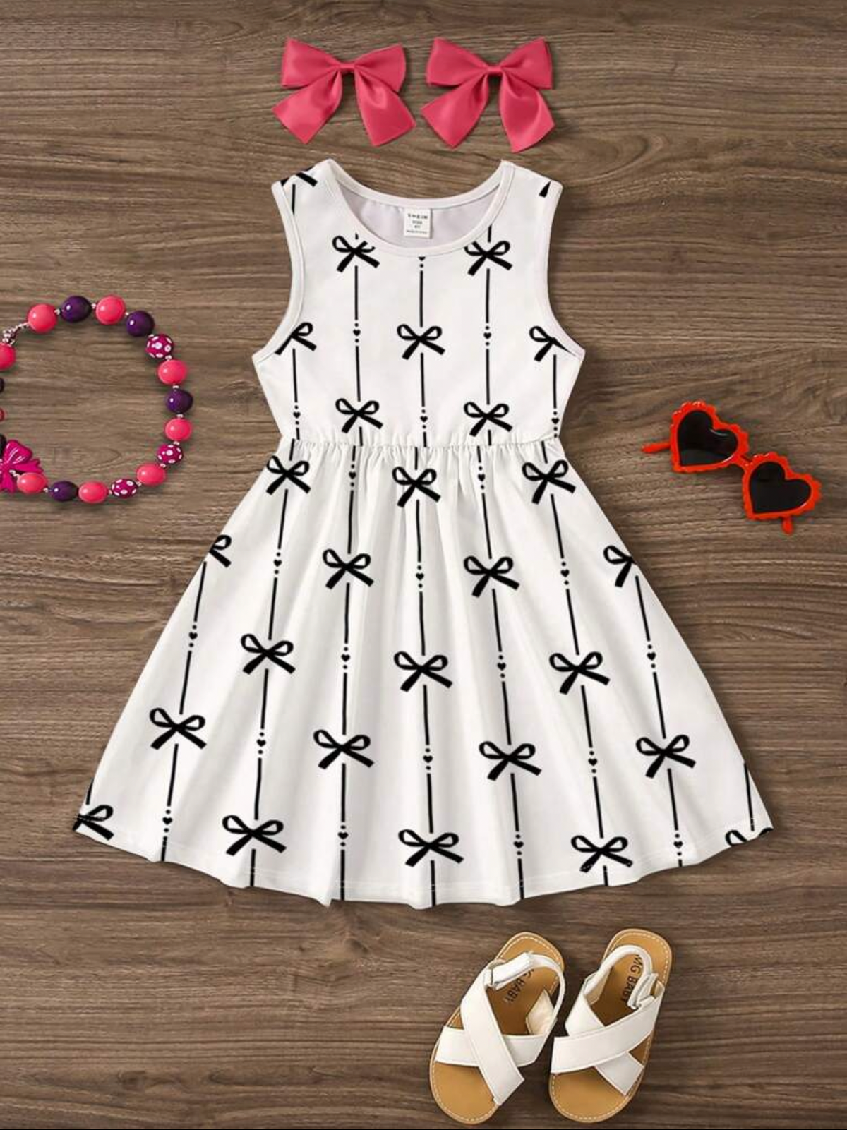 Vestido de niña con lazos