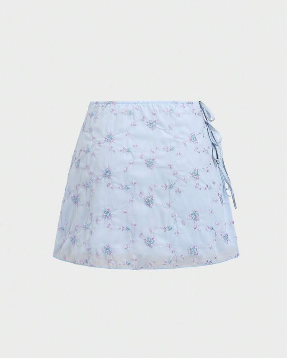 Falda celeste floreada