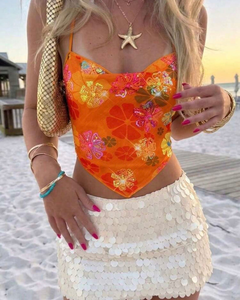 Top naranja con lentejuelas