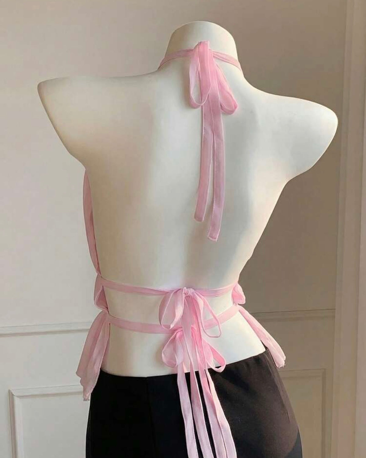 Blusa rosa espalda descubierta
