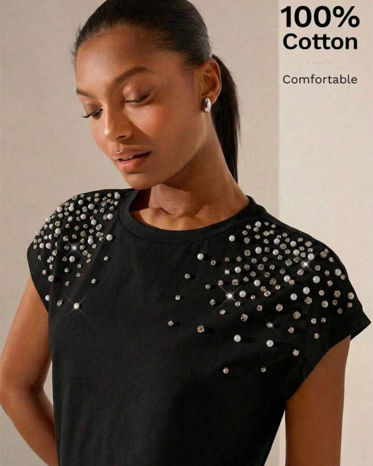 Blusa negra con perlas