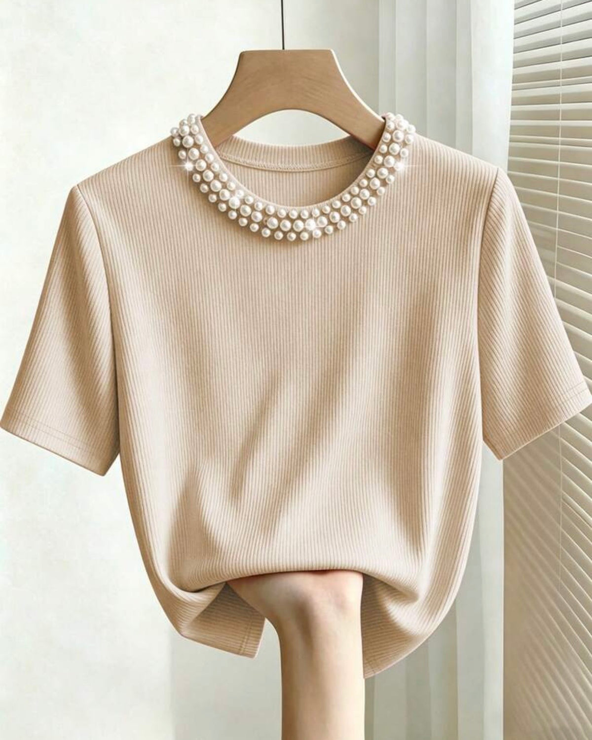 Blusa albaricoque con perlas