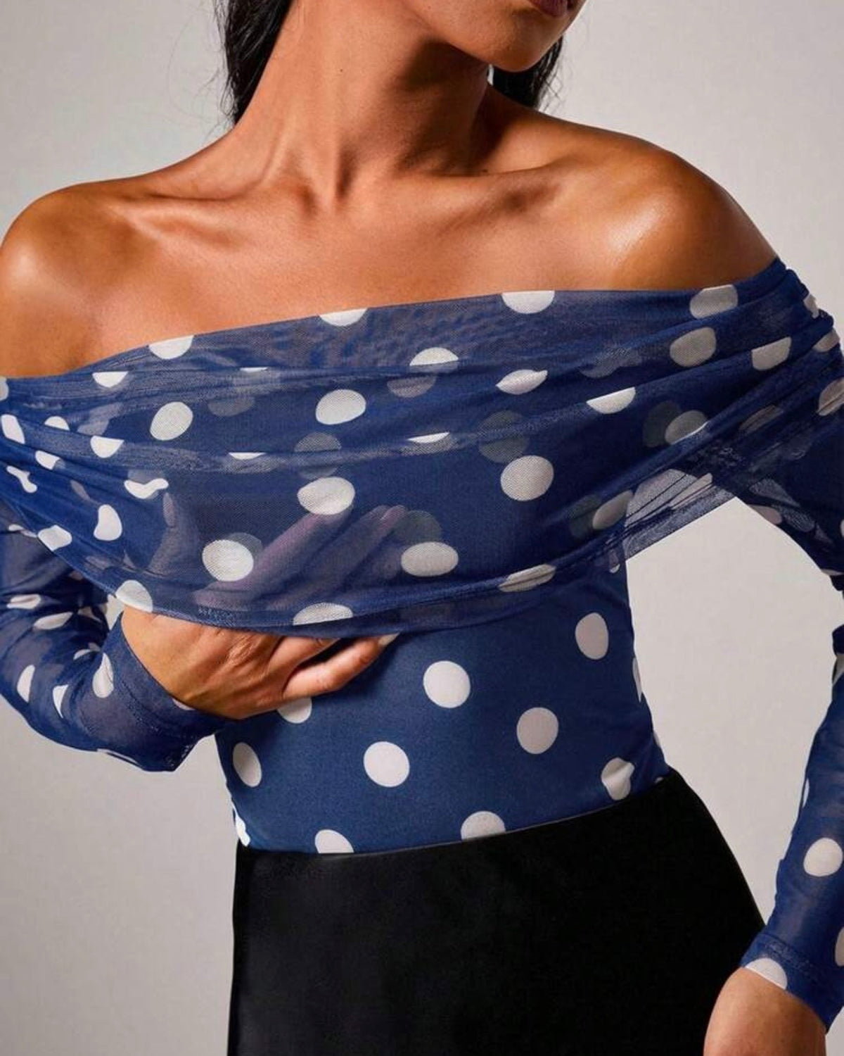 Body azul con pelotas blancas