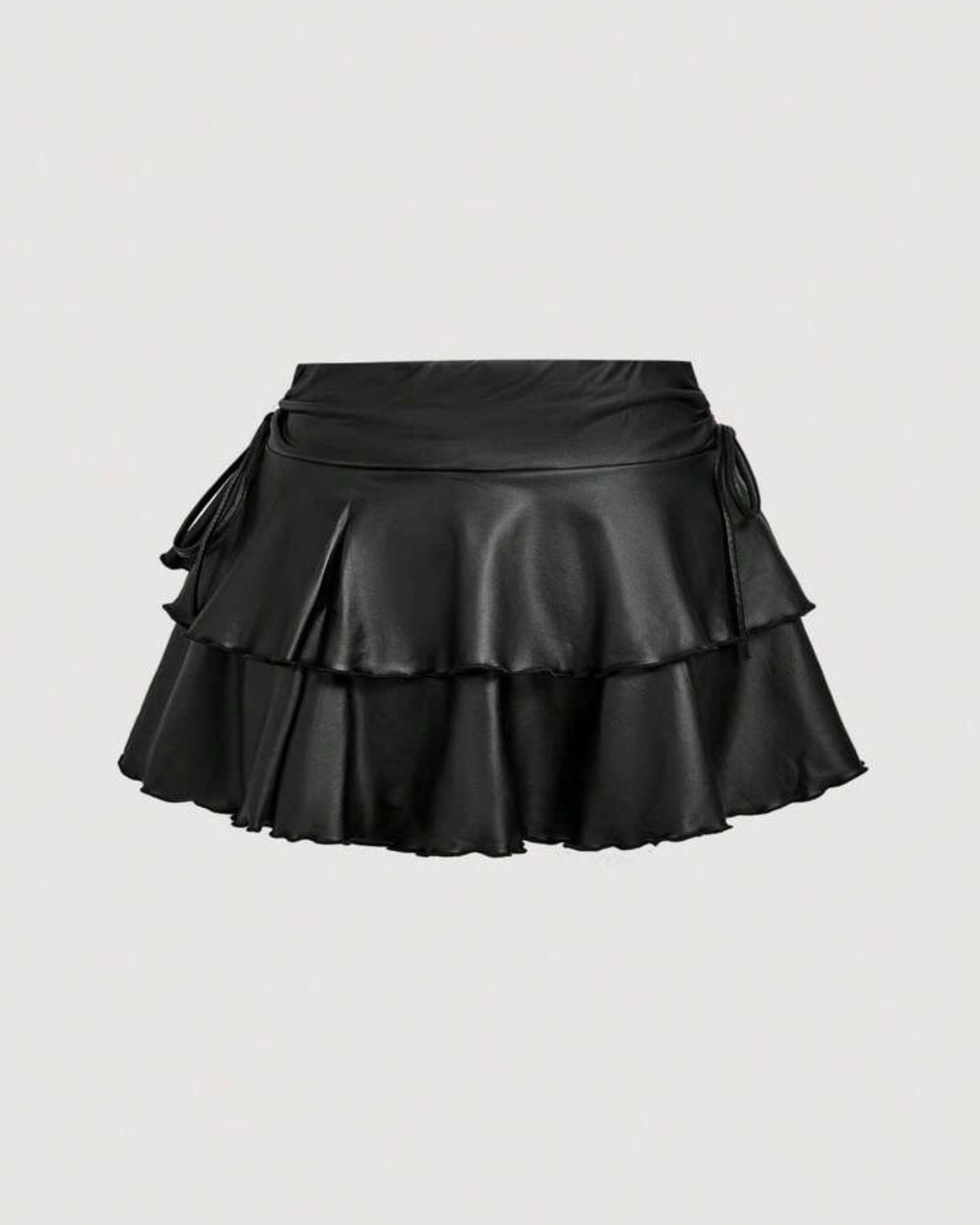 Falda negra de vuelos
