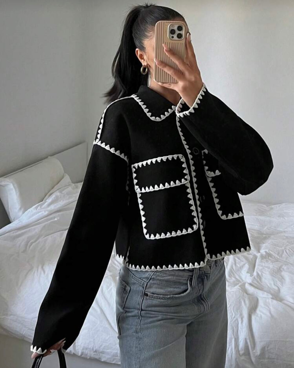 Chaqueta con decoración blanca